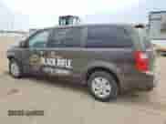 2009 Dodge Caravan with VIN 2D8HN11E09R682984, listed as a Copart auction lot 71401844 with 58,819 mi miles and Salvage title. Bid and sale history available at DreamBid. Image 2.