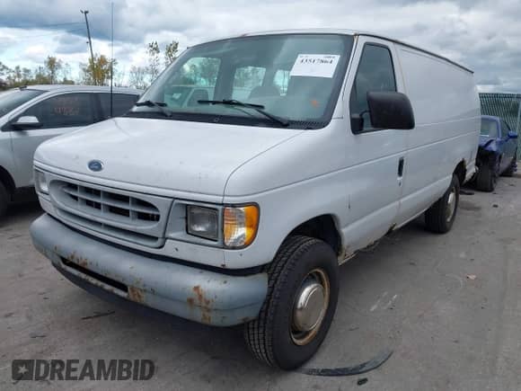 2002 Ford Econoline Cargo with VIN 1FTNS24212HB49304, listed as a IAAI auction lot 43517864 with 189,048 mi miles and . Bid and sale history available at DreamBid. Image 2.
