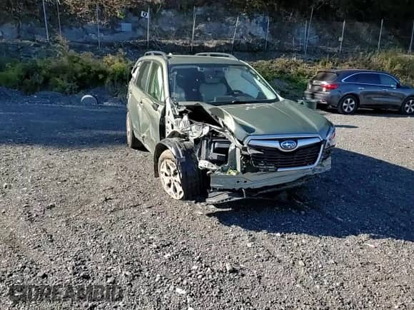 2020 Subaru Forester Premium z VIN JF2SKAJC4LH419414, wystawiony jako Copart lot #86699355 z przebiegiem 53 701 mil mil oraz Szkoda całkowita • Salvage title. Historia ofert i sprzedaży dostępna na DreamBid. Obrazek 14.