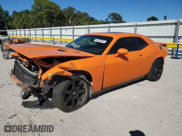 2014 Dodge Challenger R/T Plus with VIN 2C3CDYBT0EH158207, listed as a Copart auction lot 49738195 with 144,605 mi miles and Salvage title. Bid and sale history available at DreamBid. Image 1.