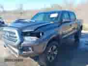 2017 Toyota Tacoma TRD Off Road with VIN 5TFAZ5CN2HX027623, listed as a IAAI auction lot 41731461 with 103,232 mi miles and . Bid and sale history available at DreamBid. Image 2.