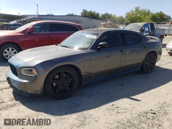 2010 Dodge Charger R/T with VIN 2B3CA5CT5AH151010, listed as a Copart auction lot 66169725 with 137,233 mi miles and Salvage title. Bid and sale history available at DreamBid. Image 1.