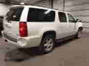 2010 Chevrolet Suburban LT z VIN 1GNUKJE32AR272865, wystawiony jako IAAI lot #43260380 z przebiegiem 167 294 mil mil oraz . Historia ofert i sprzedaży dostępna na DreamBid. Obrazek 4.