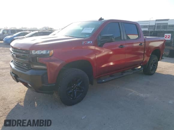 2021 Chevrolet Silverado 1500 LT Trail Boss z VIN 1GCPYFEL2MZ386824, wystawiony jako IAAI lot #43395336 z przebiegiem 70 010 mil mil oraz . Historia ofert i sprzedaży dostępna na DreamBid. Obrazek 2.