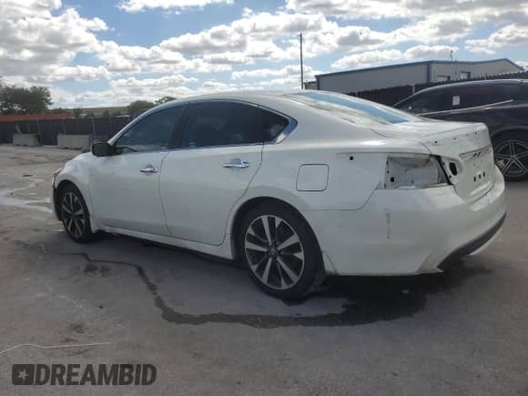 2016 Nissan Altima SR with VIN 1N4AL3AP2GC265512, listed as a Copart auction lot 84906895 with 196,243 mi miles and Salvage title. Bid and sale history available at DreamBid. Image 2.
