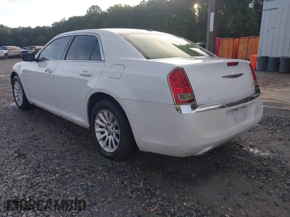 2013 Chrysler 300 with VIN 2C3CCAAG0DH577719, listed as a IAAI auction lot 42995775 with 245,749 mi miles and . Bid and sale history available at DreamBid. Image 3.