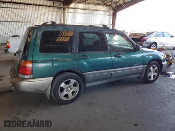1999 Subaru Forester S with VIN JF1SF6557XG746774, listed as a Copart auction lot 66852165 with 345,706 mi miles and Clean title. Bid and sale history available at DreamBid. Image 3.