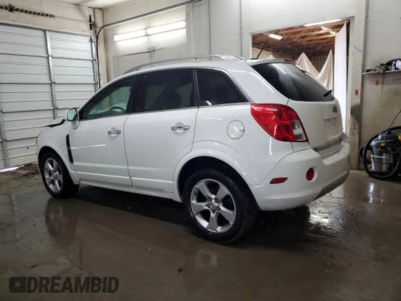 2014 Chevrolet Captiva Sport LT with VIN 3GNAL3EK3ES578317, listed as a Copart auction lot 64889154 with 107,214 mi miles and Salvage title. Bid and sale history available at DreamBid. Image 2.