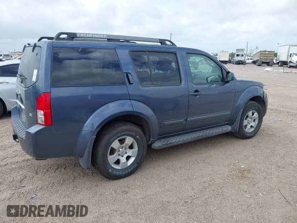 2005 Nissan Pathfinder SE with VIN 5N1AR18W95C718169, listed as a IAAI auction lot 42146371 with 128,812 mi miles and . Bid and sale history available at DreamBid. Image 4.