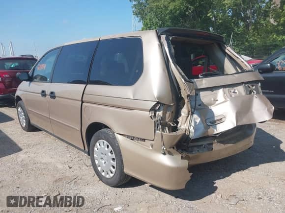 2002 Honda Odyssey LX with VIN 2HKRL18582H575649, listed as a IAAI auction lot 42919711 with 268,961 mi miles and . Bid and sale history available at DreamBid. Image 3.