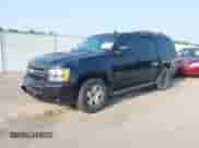 2014 Chevrolet Tahoe LT with VIN 1GNSCBE01ER235571, listed as a IAAI auction lot 42403118 with 238,069 mi miles and . Bid and sale history available at DreamBid. Image 2.