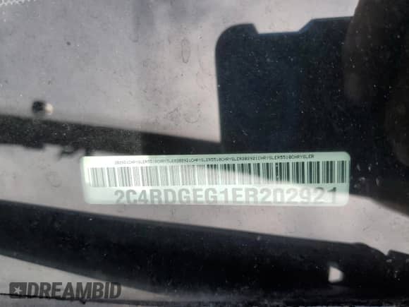 2014 Dodge Grand Caravan R/T with VIN 2C4RDGEG1ER202921, listed as a Copart auction lot 62523525 with 96,045 mi miles and Salvage title. Bid and sale history available at DreamBid. Image 13.