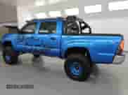 2005 Toyota Tacoma PreRunner with VIN 3TMJU62N05M002100, listed as a Copart auction lot 84837805 with 300,227 mi miles and Clean title. Bid and sale history available at DreamBid. Image 2.