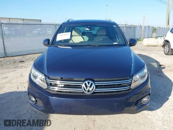 2016 Volkswagen Tiguan S z VIN WVGAV7AX7GW014264, wystawiony jako IAAI lot #43094564 z przebiegiem 98 866 mil mil oraz . Historia ofert i sprzedaży dostępna na DreamBid. Obrazek 13.