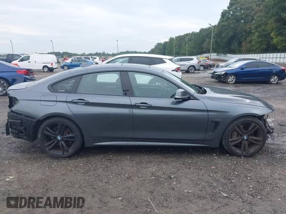 2015 BMW 4 Series 435i with VIN WBA4B1C50FD955386, listed as a IAAI auction lot 43322486 with 105,000 mi miles and . Bid and sale history available at DreamBid. Image 14.