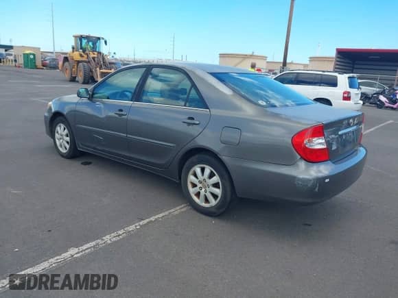 2004 Toyota Camry LE with VIN 4T1BE32K24U864455, listed as a IAAI auction lot 42496214 with 159,100 mi miles and . Bid and sale history available at DreamBid. Image 3.