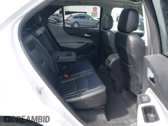 2018 Chevrolet Equinox LT z VIN 2GNAXTEX2J6238715, wystawiony jako IAAI lot #43347566 z przebiegiem 84 854 mil mil oraz . Historia ofert i sprzedaży dostępna na DreamBid. Obrazek 8.