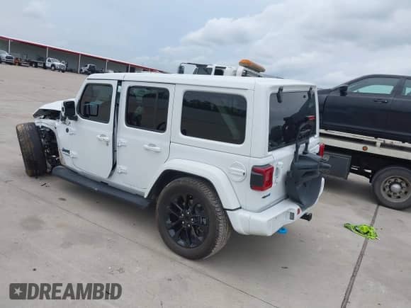 2021 Jeep Wrangler Unlimited Sahara with VIN 1C4JJXP63MW723803, listed as a IAAI auction lot 42395934 with 72,814 mi miles and . Bid and sale history available at DreamBid. Image 3.