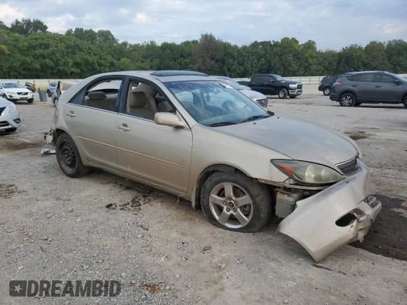 2002 Toyota Camry XLE with VIN 4T1BF32K02U504563, listed as a Copart auction lot 80865775 with Not provided miles and Salvage title. Bid and sale history available at DreamBid. Image 4.