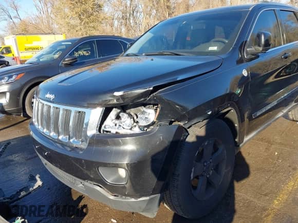 2011 Jeep Grand Cherokee 70th Anniversary z VIN 1J4RR4GT8BC504618, wystawiony jako IAAI lot #40993960 z przebiegiem 188 098 mil mil oraz . Historia ofert i sprzedaży dostępna na DreamBid. Obrazek 6.