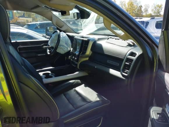 2020 Ram 1500 Laramie with VIN 1C6SRFRT7LN344695, listed as a IAAI auction lot 43316492 with 57,326 mi miles and . Bid and sale history available at DreamBid. Image 5.