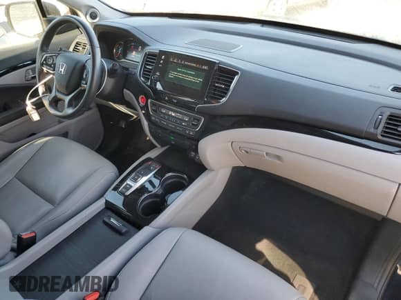 2022 Honda Pilot Touring 8-Passenger с VIN 5FNYF5H94NB004806, выставлен на аукционе Copart как лот 75065064 с пробегом 61 561 миль миль и Списание • Salvage title. История ставок и продаж доступна на DreamBid. Изображение 8.