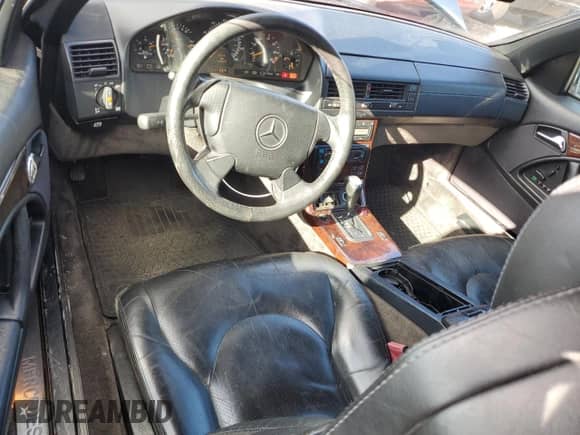 1997 Mercedes-Benz SL 500 с VIN WDBFA63F7VF145758, выставлен на аукционе Copart как лот 77503244 с пробегом 132 664 миль миль и Чистый • Clean title. История ставок и продаж доступна на DreamBid. Изображение 8.