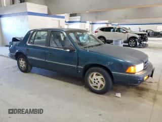 1994 Dodge Spirit Highline z VIN 1B3AA4636RF148742, wystawiony jako Copart lot #45249505 z przebiegiem 89 040 mil mil oraz Szkoda całkowita • Salvage title. Historia ofert i sprzedaży dostępna na DreamBid. Obrazek 4.