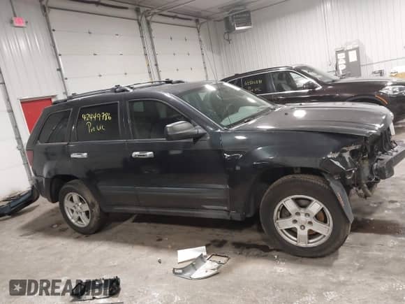 2005 Jeep Grand Cherokee Laredo with VIN 1J4HS48N35C658626, listed as a IAAI auction lot 42449786 with Not provided miles and . Bid and sale history available at DreamBid. Image 13.