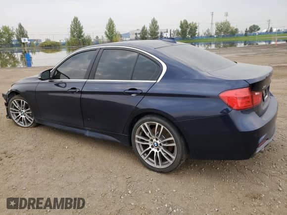 2015 BMW 3 Series 335i xDrive with VIN WBA3B9C51FP705311, listed as a Copart auction lot 71154505 with 152,497 mi miles and Salvage title. Bid and sale history available at DreamBid. Image 2.