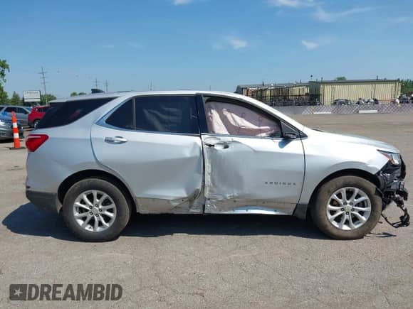 2019 Chevrolet Equinox LT z VIN 2GNAXJEV7K6230579, wystawiony jako IAAI lot #42834271 z przebiegiem 96 912 mil mil oraz . Historia ofert i sprzedaży dostępna na DreamBid. Obrazek 13.