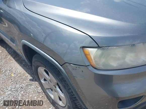 2012 Jeep Grand Cherokee Limited z VIN 1C4RJEBGXCC290696, wystawiony jako IAAI lot #42753634 z przebiegiem 205 808 mil mil oraz . Historia ofert i sprzedaży dostępna na DreamBid. Obrazek 6.