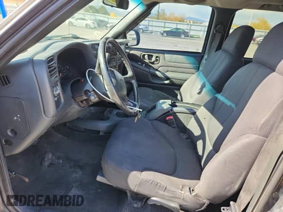 2003 Chevrolet S-10 LS with VIN 1GCDT13X53K180687, listed as a Copart auction lot 89549505 with 142,593 mi miles and Salvage title. Bid and sale history available at DreamBid. Image 7.