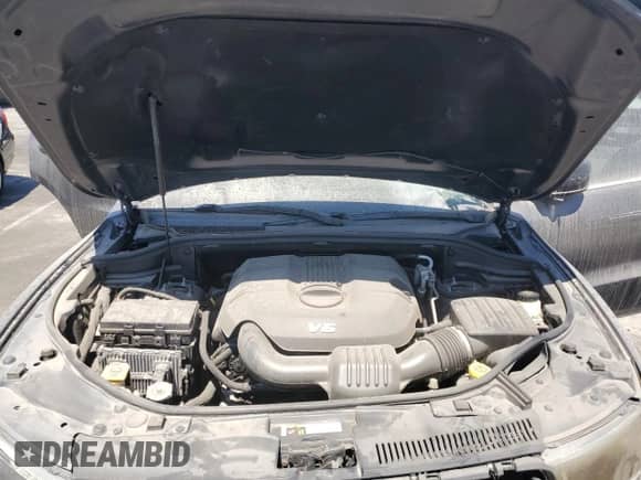 2015 Dodge Durango SXT with VIN 1C4RDHAG8FC201500, listed as a Copart auction lot 71183915 with 100,084 mi miles and Salvage title. Bid and sale history available at DreamBid. Image 12.