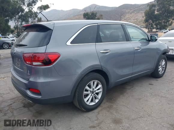 2020 Kia Sorento LX with VIN 5XYPG4A39LG669053, listed as a IAAI auction lot 42371689 with 58,952 mi miles and . Bid and sale history available at DreamBid. Image 4.