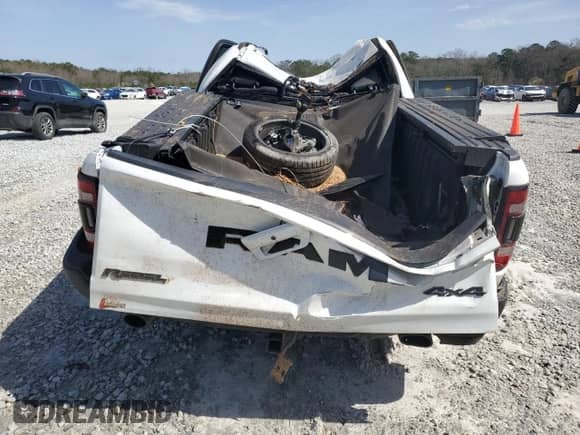 2022 Ram 1500 Rebel z VIN 1C6SRFLM7NN131895, wystawiony jako Copart lot #48122655 z przebiegiem 51 211 mil mil oraz Szkoda całkowita • Salvage title. Historia ofert i sprzedaży dostępna na DreamBid. Obrazek 6.