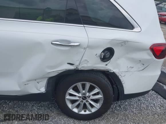 2020 Kia Sorento LX with VIN 5XYPG4A39LG694406, listed as a IAAI auction lot 43085393 with 108,132 mi miles and . Bid and sale history available at DreamBid. Image 6.