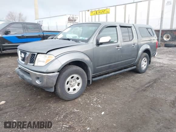 2007 Nissan Frontier LE with VIN 1N6AD07W97C434894, listed as a IAAI auction lot 41689201 with 137,000 mi miles and . Bid and sale history available at DreamBid. Image 2.