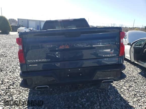 2019 Chevrolet Silverado 1500 Custom Trail Boss with VIN 1GCRYCEF0KZ261674, listed as a Copart auction lot 52117555 with 76,136 mi miles and Salvage title. Bid and sale history available at DreamBid. Image 6.