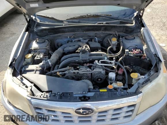 2013 Subaru Forester X Premium с VIN JF2SHADC8DH412333, выставлен на аукционе Copart как лот 84029405 с пробегом 158 130 миль миль и Списание • Salvage title. История ставок и продаж доступна на DreamBid. Изображение 12.