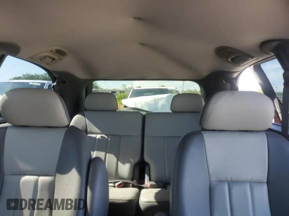 2004 Dodge Caravan SXT with VIN 2D4GP44L64R538237, listed as a Copart auction lot 60810815 with 122,766 mi miles and Salvage title. Bid and sale history available at DreamBid. Image 10.