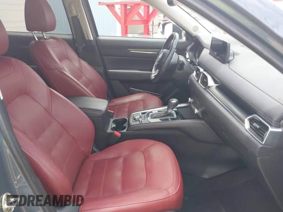 2022 Mazda CX-5 S Preferred z VIN JM3KFBCM8N1581273, wystawiony jako IAAI lot #42568772 z przebiegiem 23 557 mil mil oraz . Historia ofert i sprzedaży dostępna na DreamBid. Obrazek 5.