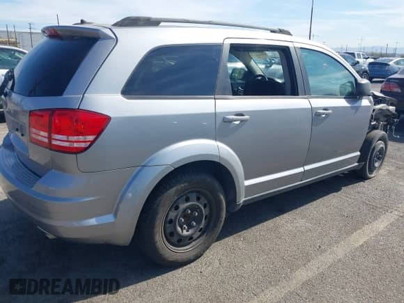2017 Dodge Journey SE with VIN 3C4PDCAB0HT683398, listed as a IAAI auction lot 43052069 with 139,025 mi miles and . Bid and sale history available at DreamBid. Image 4.
