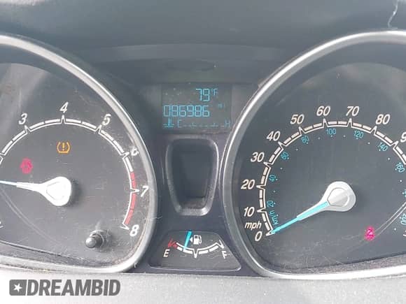 2015 Ford Fiesta SE z VIN 3FADP4BE9FM161178, wystawiony jako IAAI lot #42702671 z przebiegiem 86 986 mil mil oraz . Historia ofert i sprzedaży dostępna na DreamBid. Obrazek 7.