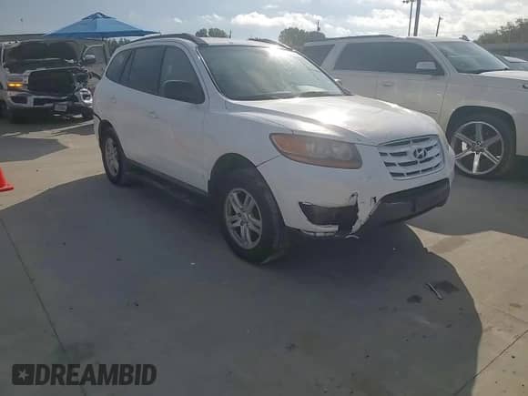 2010 Hyundai Santa Fe GLS z VIN 5NMSG3AB8AH392717, wystawiony jako Copart lot #81711175 z przebiegiem 171 345 mil mil oraz Szkoda całkowita • Salvage title. Historia ofert i sprzedaży dostępna na DreamBid. Obrazek 13.