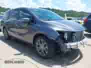 2025 Honda Odyssey Touring with VIN 5FNRL6H87SB009424, listed as a IAAI auction lot 42602484 with 14,823 mi miles and . Bid and sale history available at DreamBid. Image 1.