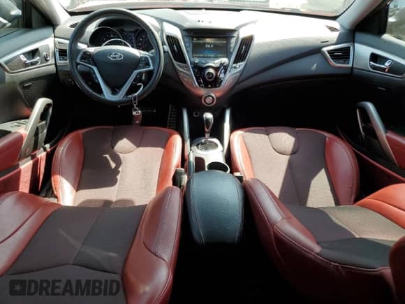 2012 Hyundai Veloster w/Red Int с VIN KMHTC6AD4CU054208, выставлен на аукционе Copart как лот 62169895 с пробегом 61 088 миль миль и Списание • Salvage title. История ставок и продаж доступна на DreamBid. Изображение 8.