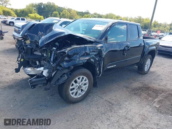 2024 Toyota Tacoma SR5 with VIN 3TMLB5JN7RM077957, listed as a IAAI auction lot 43149381 with 11,806 mi miles and . Bid and sale history available at DreamBid. Image 2.