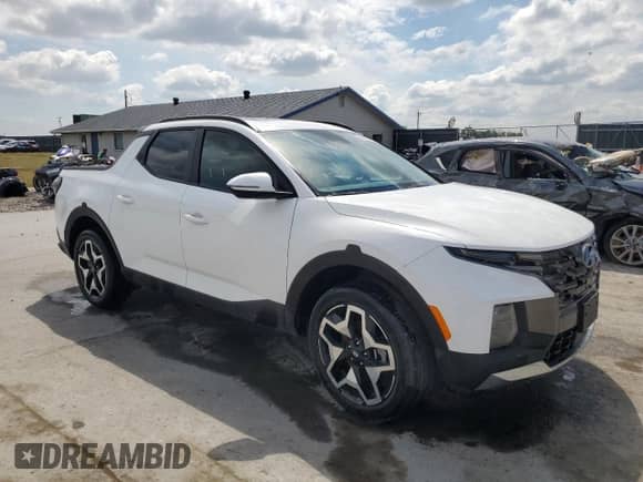 2024 Hyundai Santa Cruz Limited z VIN 5NTJEDDF3RH118394, wystawiony jako Copart lot #69829565 z przebiegiem Nie podano mil oraz Szkoda całkowita • Salvage title. Historia ofert i sprzedaży dostępna na DreamBid. Obrazek 4.
