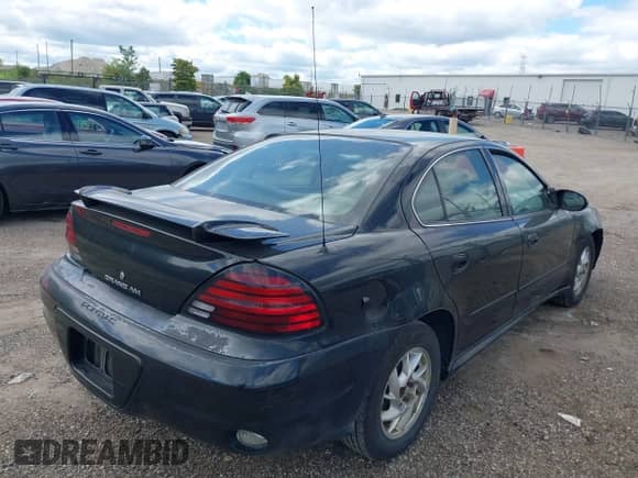 2004 Pontiac Grand Am SE with VIN 1G2NE52F84M682246, listed as a IAAI auction lot 43074420 with 183,119 mi miles and . Bid and sale history available at DreamBid. Image 4.